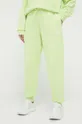 зелёный Хлопковые брюки adidas Женский