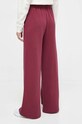 Odzież Puma spodnie dresowe 621411 bordowy