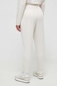 Îmbrăcăminte Puma pantaloni de trening 523877 bej