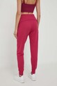Odzież United Colors of Benetton spodnie dresowe bawełniane 3J68P0472.2E8 różowy