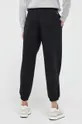New Balance spodnie dresowe Materiał zasadniczy: 64 % Bawełna, 36 % Poliester, Podszewka kieszeni: 100 % Bawełna