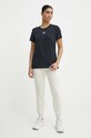 Under Armour spodnie dresowe 1379438 beżowy AW24