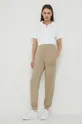 Calvin Klein Jeans spodnie dresowe bawełniane beżowy