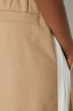 JW Anderson spodnie dresowe z domieszką wełny beżowy TR0294.PG1364