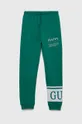 зелёный Детские хлопковые штаны Guess Для девочек