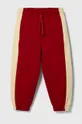 czerwony United Colors of Benetton spodnie dresowe bawełniane dziecięce Dziecięcy