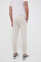Odzież EA7 Emporio Armani spodnie dresowe bawełniane 6RPP73.PJ05Z beżowy