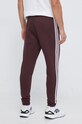 Odzież adidas Originals spodnie dresowe IM2109 bordowy