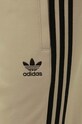 Tepláky adidas Originals béžová IM4544