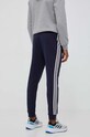 Odzież adidas spodnie dresowe Essentials IJ6493 granatowy
