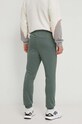 Odzież Fila spodnie dresowe VR46 FAM0470 zielony