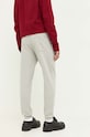 Odzież Tommy Jeans spodnie dresowe DM0DM17842 szary
