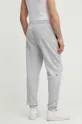 Бавовняні спортивні штани Lacoste сірий