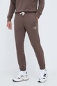 New Balance spodnie dresowe dzianina brązowy MP33509DUO