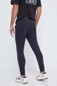 Odzież Under Armour spodnie dresowe 1380843 czarny