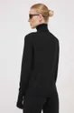 Calvin Klein gyapjú pulóver Jelentős anyag: 100% gyapjú Szegély: 82% gyapjú, 16% poliamid, 2% elasztán