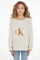бежевий Дитячий бавовняний светр Calvin Klein Jeans Для дівчаток