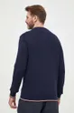 Ένα πουλόβερ σε μείγμα μεταξιού Tommy Hilfiger  70% Βαμβάκι, 22% Πολυαμίδη, 8% Μετάξι
