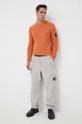 Pamučni pulover Calvin Klein Jeans narančasta