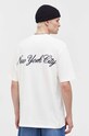 Abbigliamento Tommy Jeans t-shirt in cotone DM0DM17732 beige