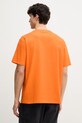 Oblečenie Bavlnené tričko Puma PUMA x PLEASURES Typo Tee 620878 oranžová