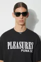 černá Bavlněné tričko Puma PUMA x PLEASURES Typo Tee