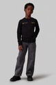 Dečki Otroški bombažen pulover Calvin Klein Jeans IB0IB02212.104.116.9BYH črna