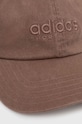 adidas czapka z daszkiem bawełniana SPW DAD CAP IX8015 brązowy SS25