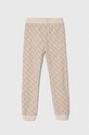 Detské bavlnené tepláky Guess bavlna béžová J4YQ11.KA6R4.9BYH