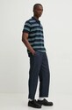 Bavlněné polo tričko Tommy Jeans DM0DM19502 námořnická modř AW24