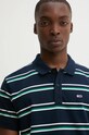 Bavlněné polo tričko Tommy Jeans námořnická modř DM0DM19502