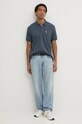 Бавовняне поло Tommy Jeans DM0DM19622 блакитний AW24