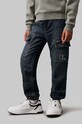Detské rifle Calvin Klein Jeans DENIM JOGGER IB0IB02116.9BYH tmavomodrá