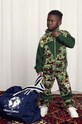 Детские спортивные штаны Mini Rodini аппликация зелёный 2471010575