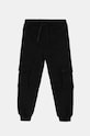 Дитячі бавовняні штани United Colors of Benetton бавовна чорний 3FWYCF05C.G.Seasonal