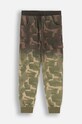 Coccodrillo spodnie dresowe bawełniane dziecięce wzorzyste zielony ZC4120102VBA