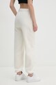 Odzież Calvin Klein Jeans spodnie dresowe J20J223920 beżowy