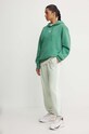 Bavlněné tepláky adidas Essentials IY4236 zelená AW24