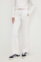 Odzież Juicy Couture spodnie dresowe welurowe TINA TRACKPANTS JCAPW045.440 biały
