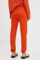 Odzież American Vintage spodnie dresowe IZU05BH24 pomarańczowy