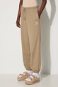 Хлопковые спортивные штаны Puma Better Classics Sweatpants бежевый 624234