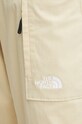 The North Face spodnie TNF x Yinka Ilori beżowy NF0A89GH3X41