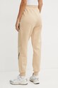 Îmbrăcăminte adidas pantaloni de trening ZNE JD9587 bej