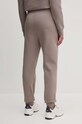 Odzież Calvin Klein spodnie dresowe K20K208330 beżowy