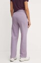 Odzież Puma spodnie dresowe 676093 fioletowy