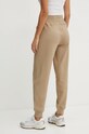 Odzież Puma spodnie 681634 beżowy