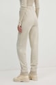 Odzież Calvin Klein Jeans spodnie dresowe bawełniane J20J224443 zielony