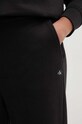 Pamučni donji dio trenirke Calvin Klein Jeans crna J20J224443