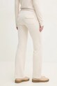 Îmbrăcăminte Juicy Couture pantaloni de trening din velur DEL RAY GOLD HW JCAP180G.692 bej