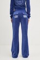 Oblečení Velurové teplákové kalhoty Juicy Couture HERITAGE CROWN CAISA LOW RISE PANT JCGBJ224012.484 modrá